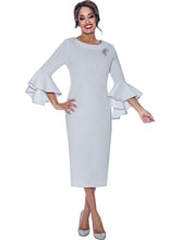 Dresses by Nubiano with flared sleeves and rhinestone brooch. Available in Black, Red or White in Sizes 8-18 and 16W-26W